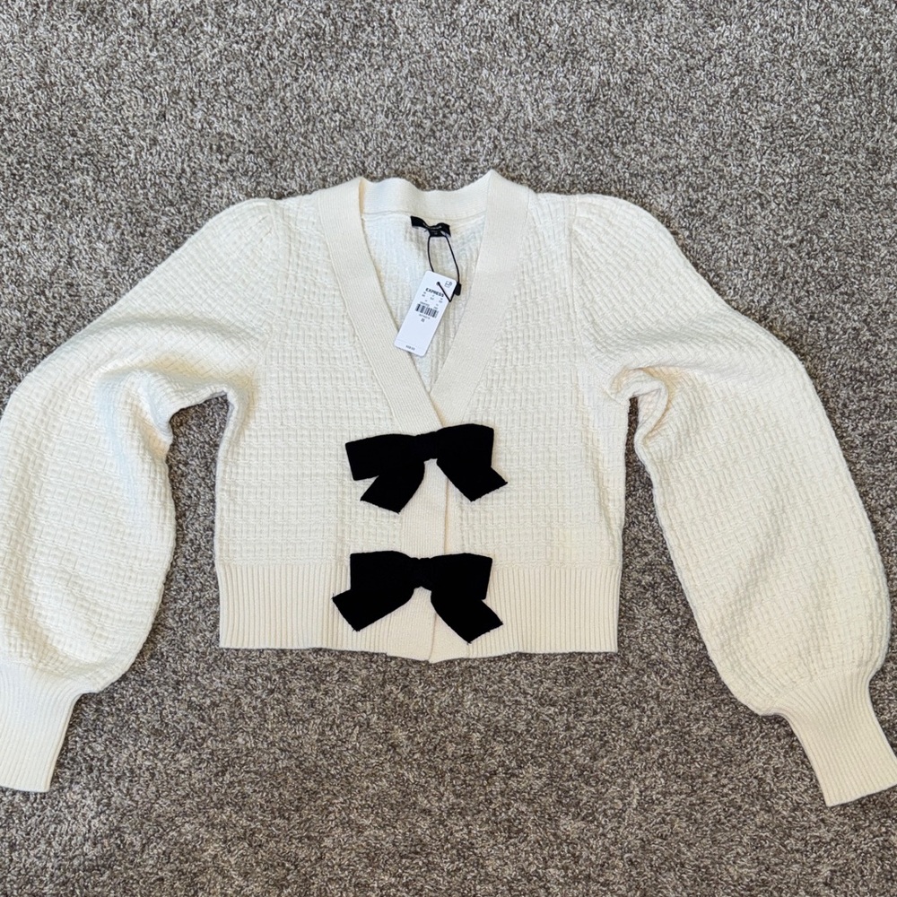 Express Cream Cardigan with Black Bow Details